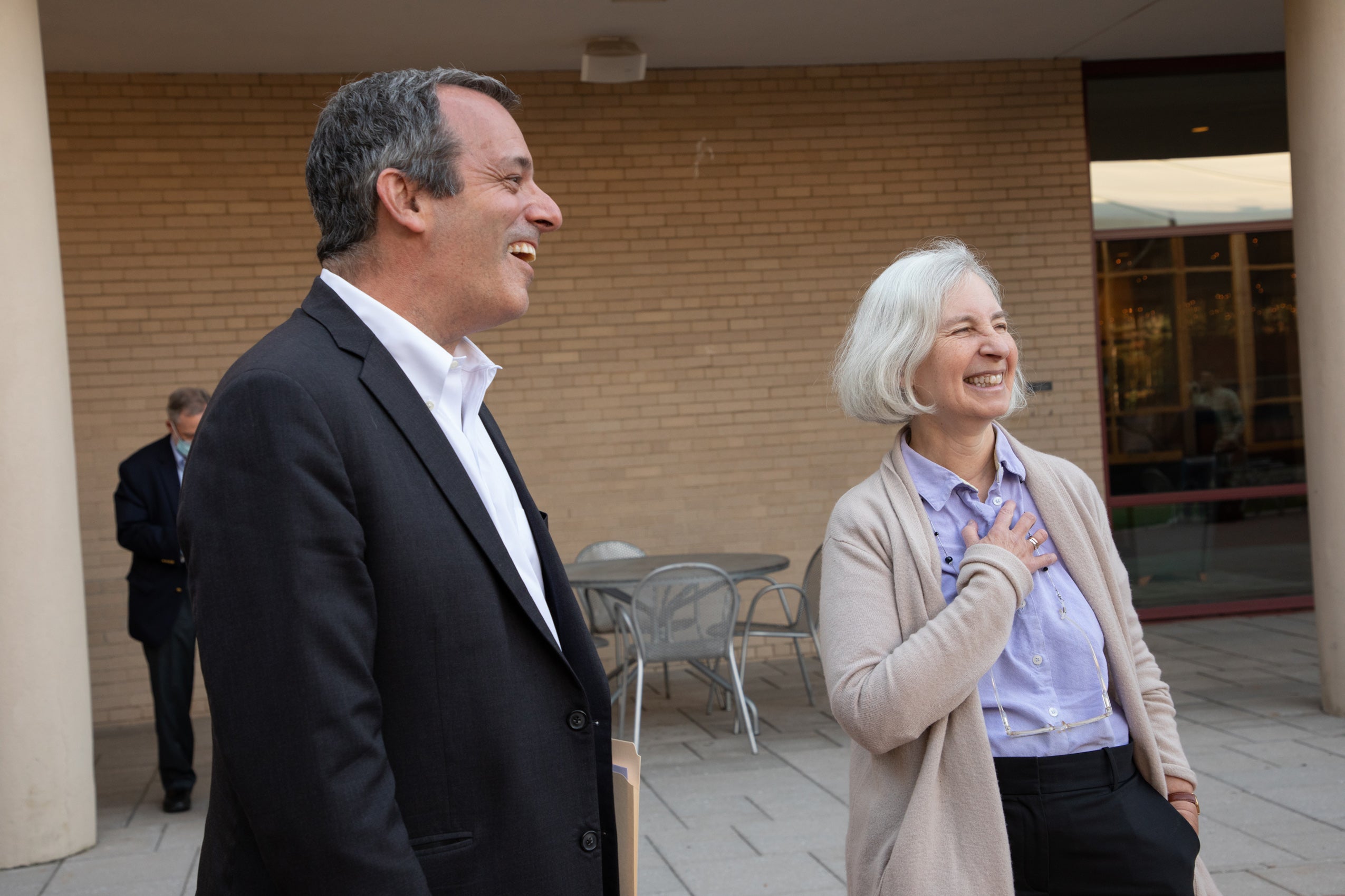 Man and woman laughing