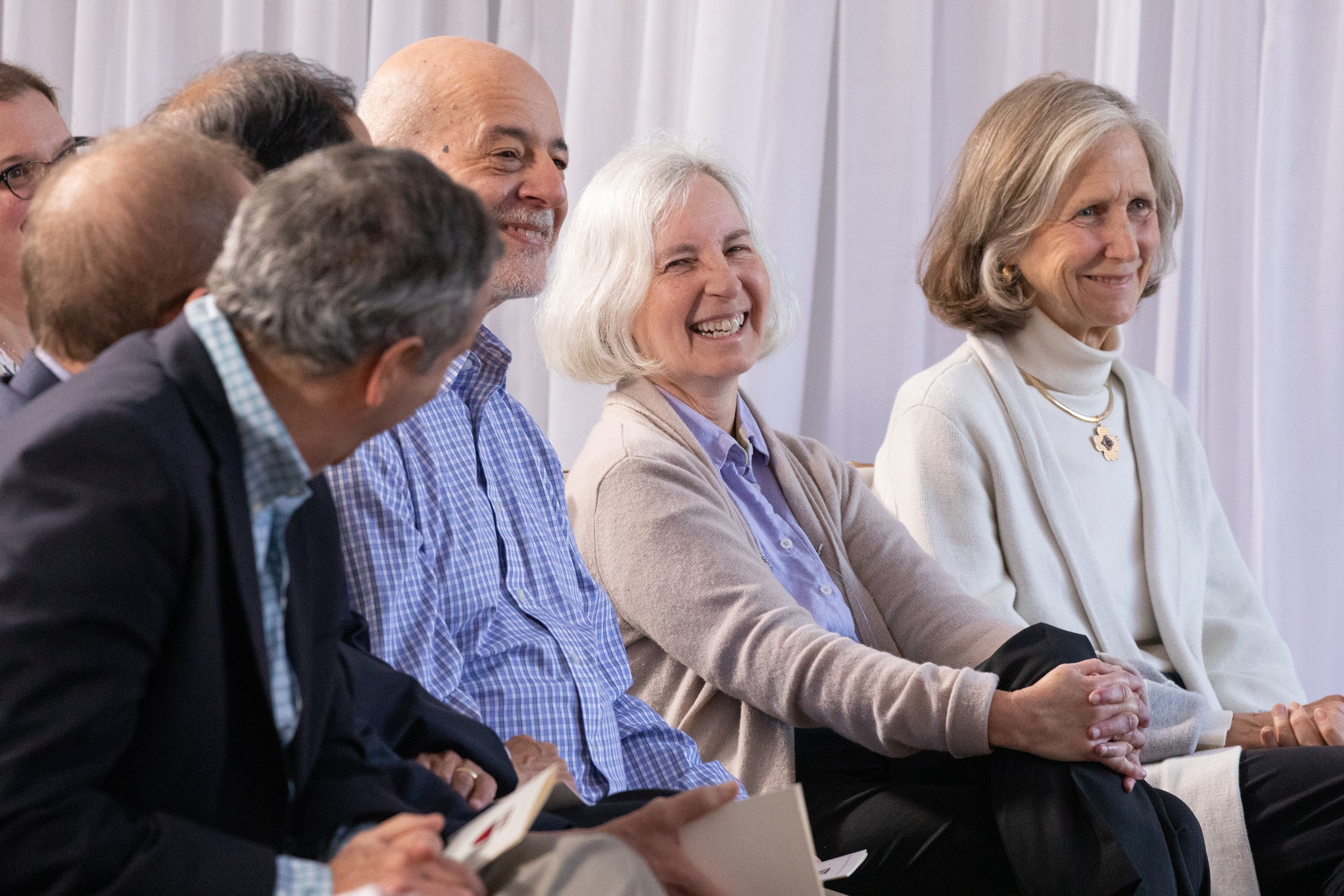 Martha Minow and Mary Minifie watch speaker