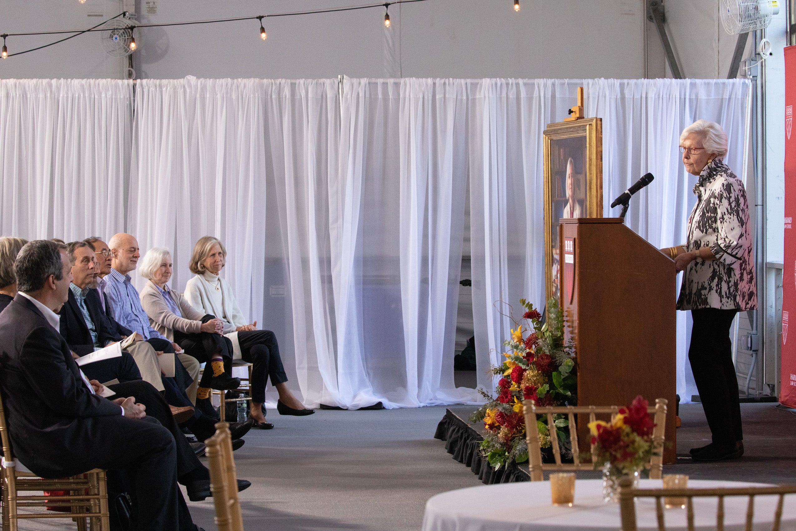 Woman speaks to audience