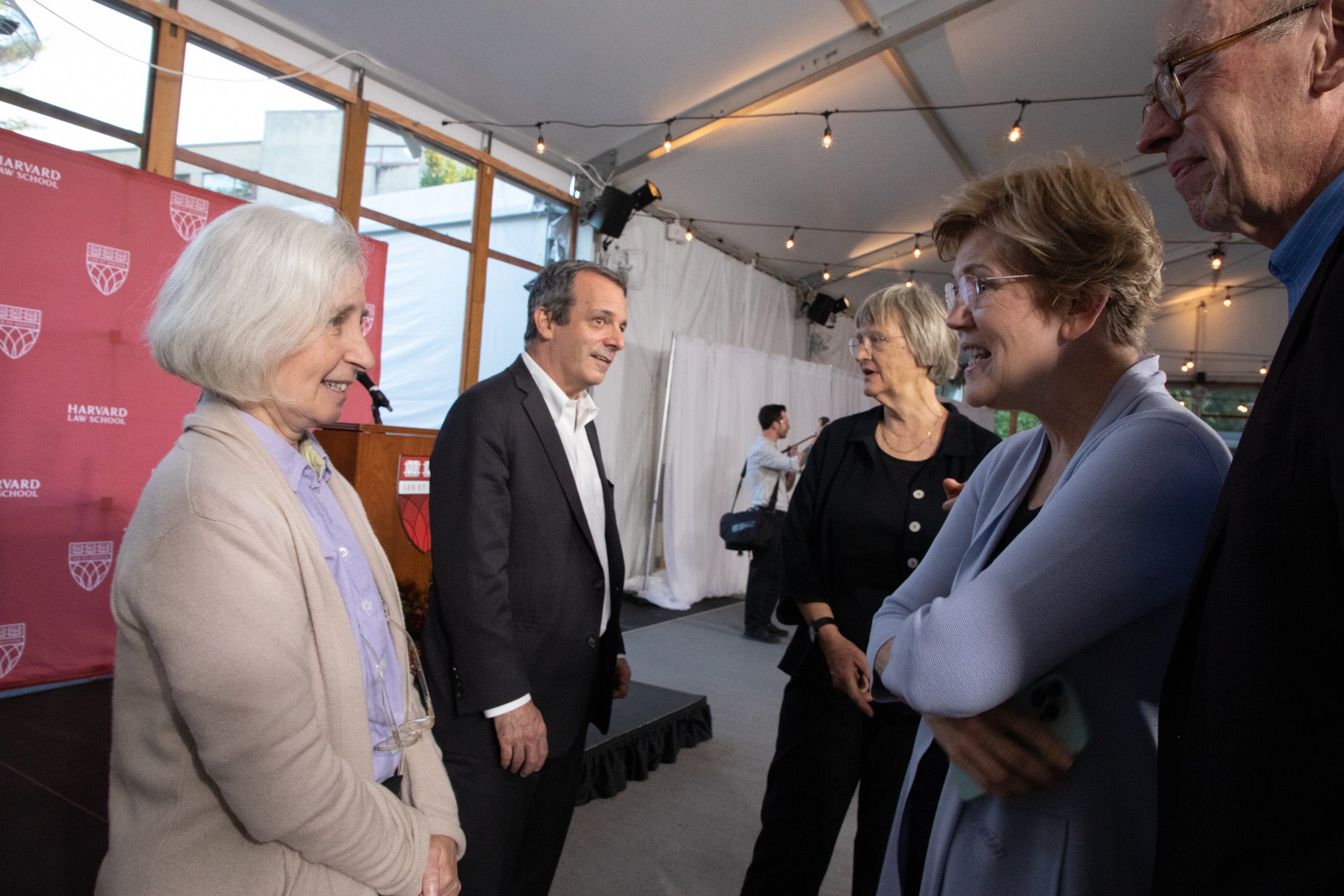 Group of people converse