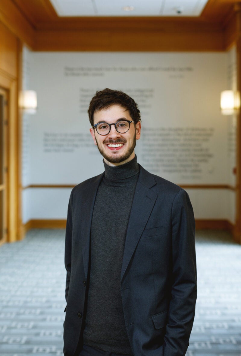 Portrait of Francisco Balbin wearing a blue blazer.