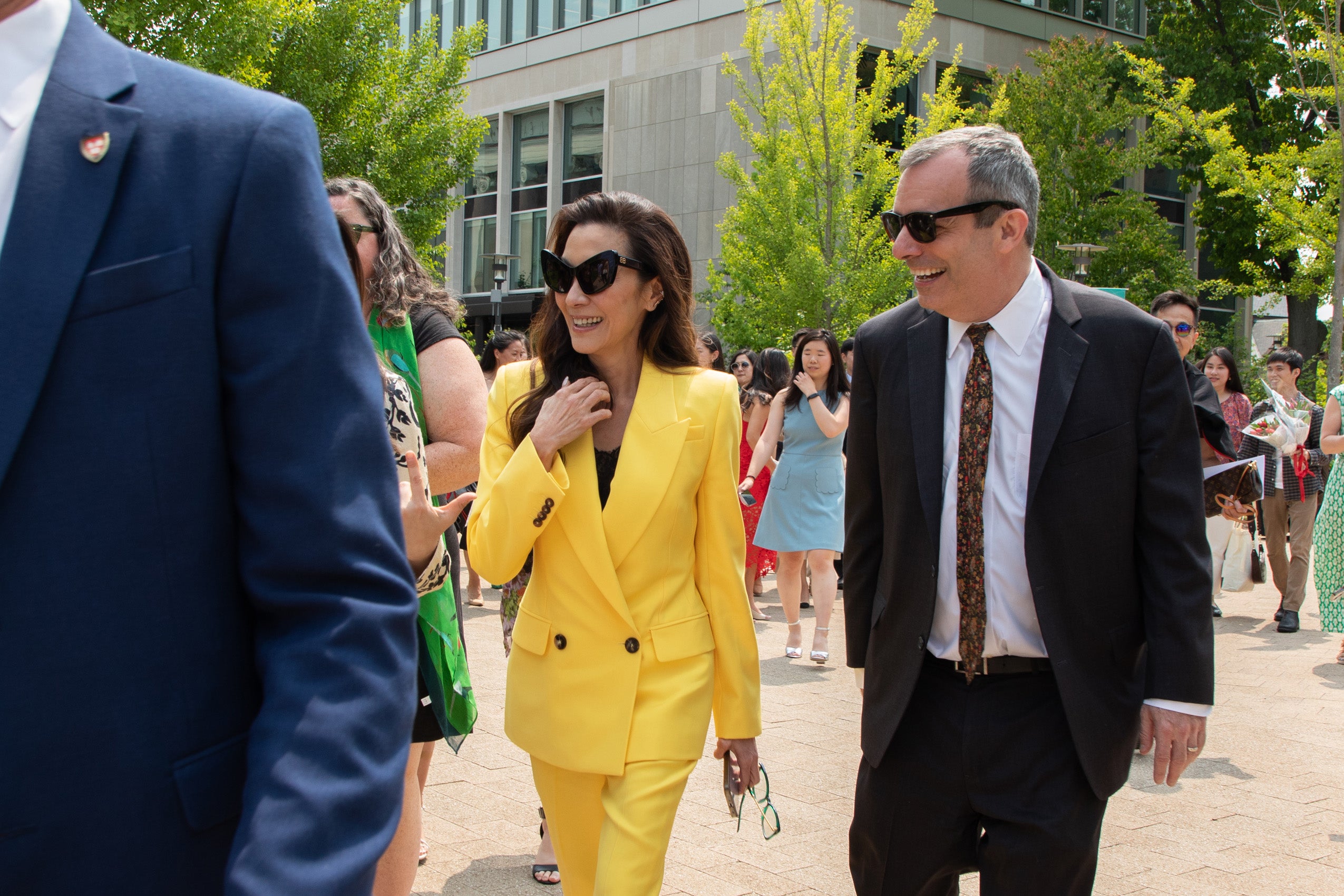 Dean John Manning and Michelle Yeoh walking