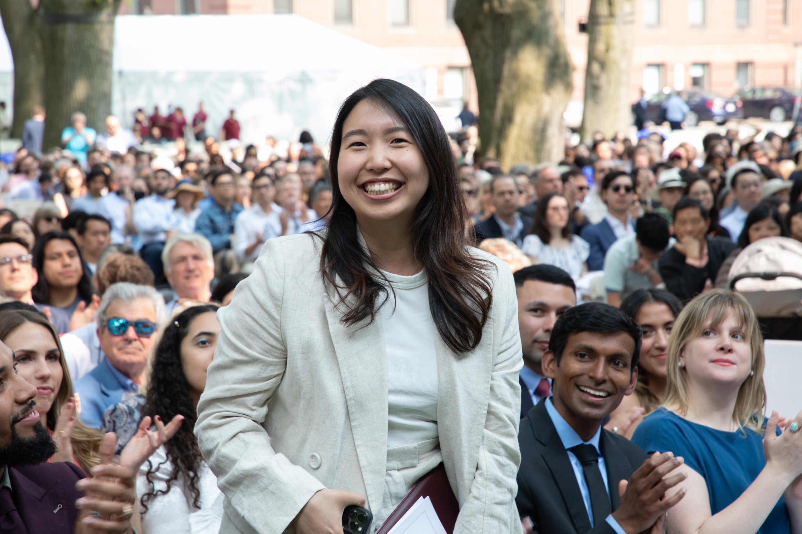 Irene Kwon stands in crowd during Class Day celebration