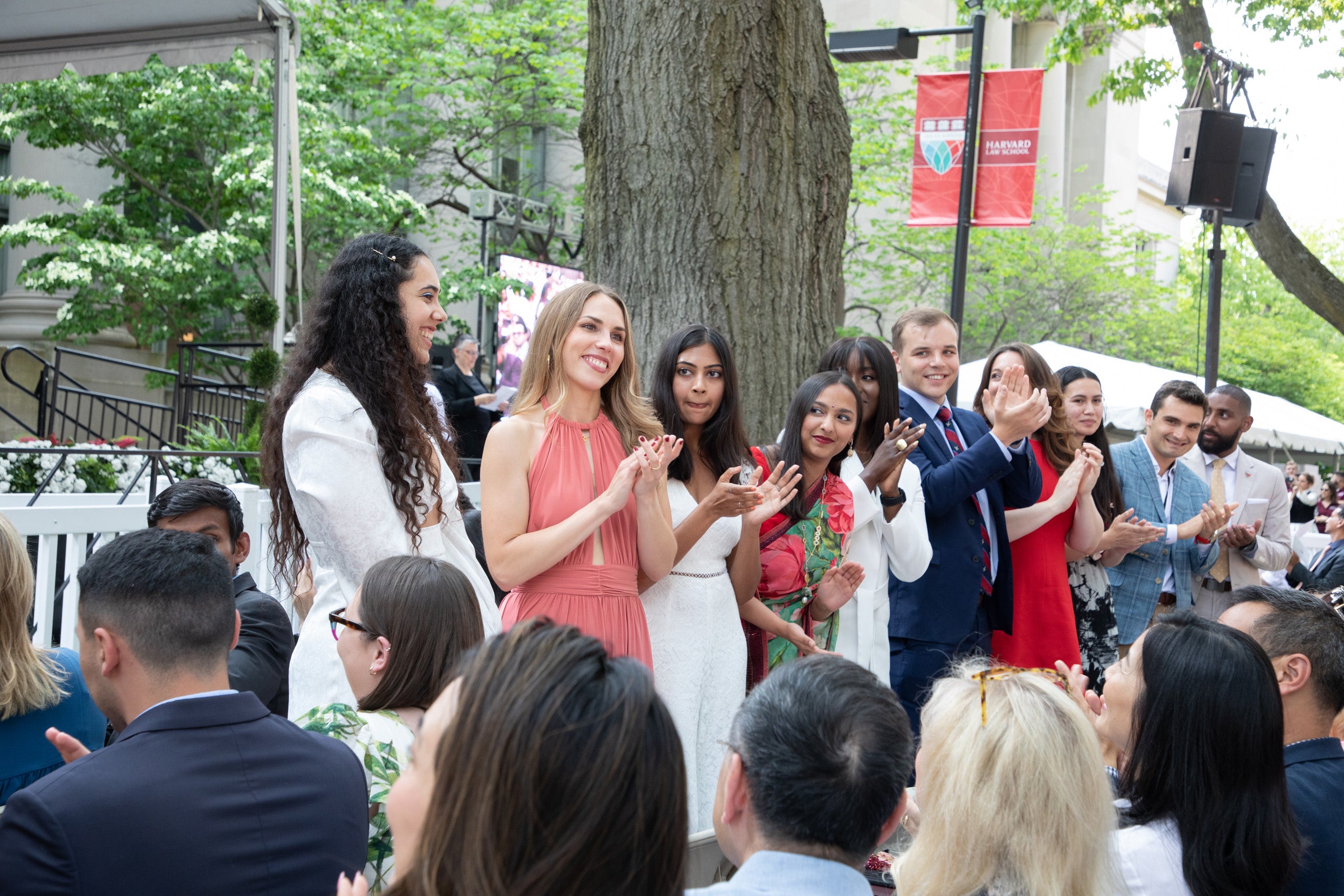 Award winners stand for applause during Class Day ceremony