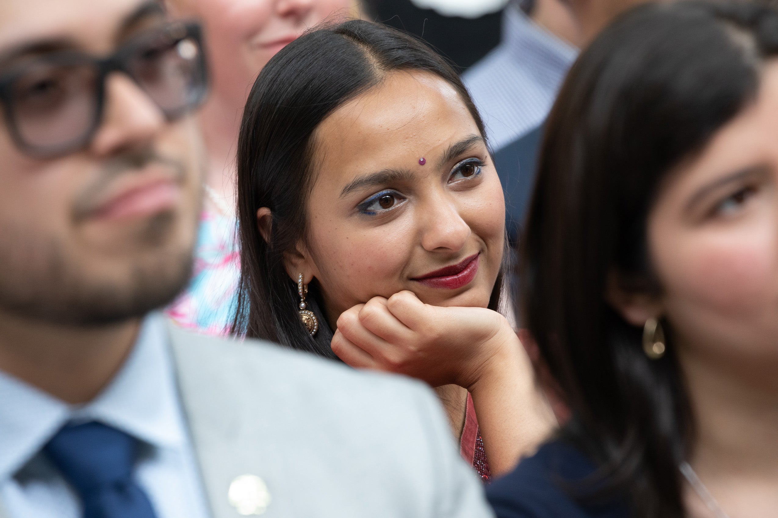 person watching speech intently