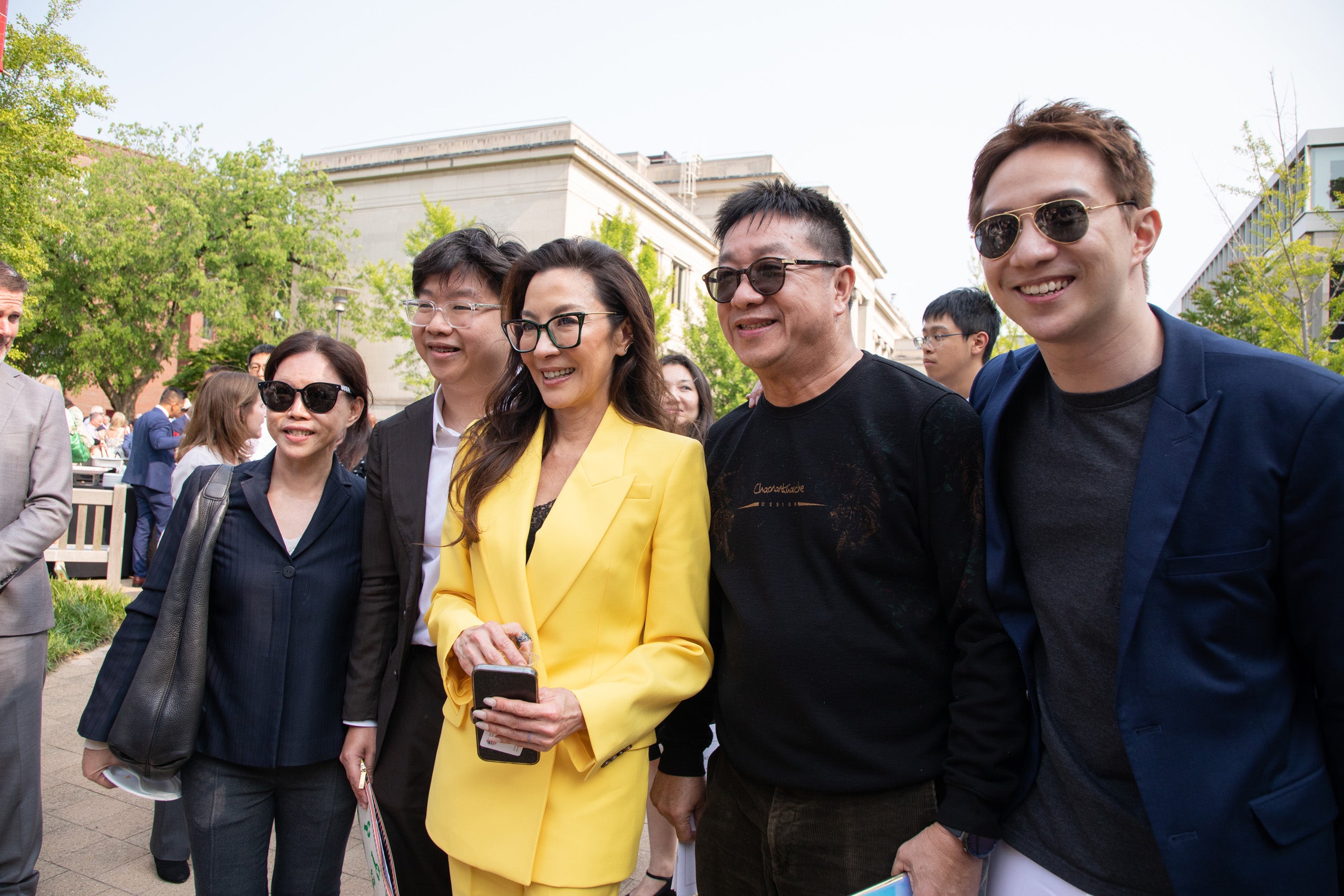 Michelle Yeoh poses with guests at Class Day
