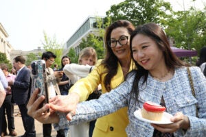 Michelle Yeoh takes selfie with guest on Class Day