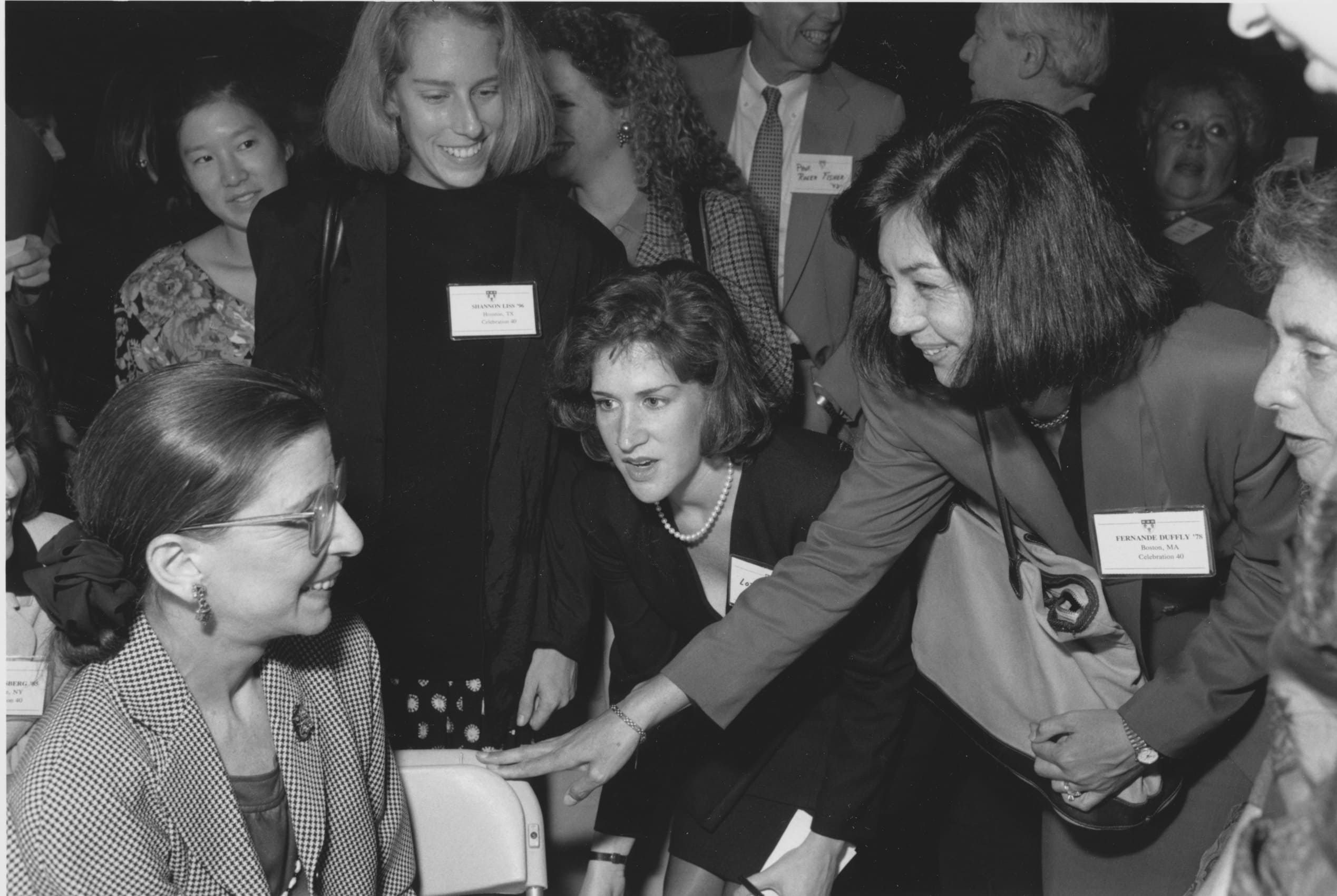 Black-and-white image of alumnae meeting Ruth Bader Ginsburg
