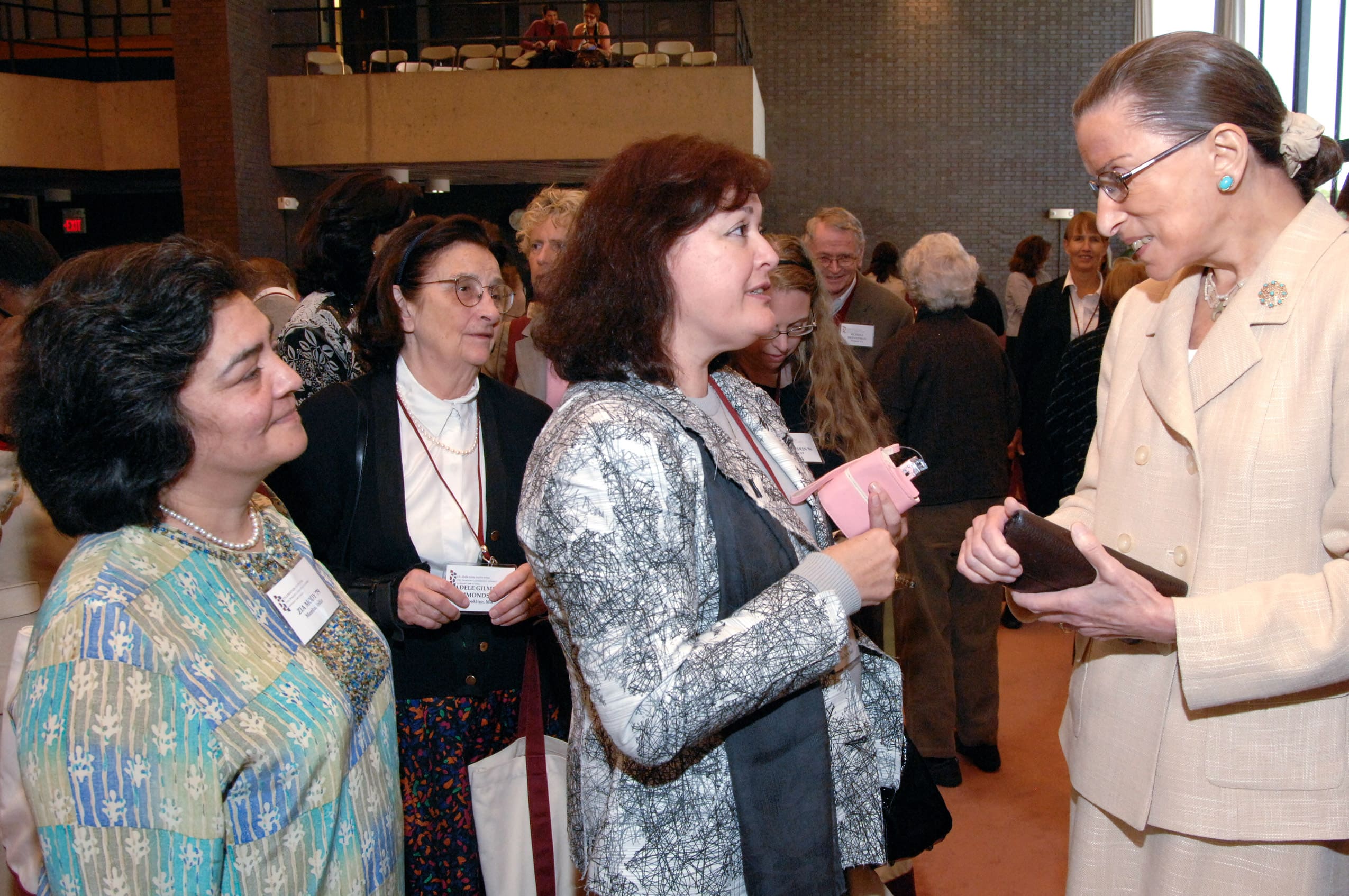 Women talking at an event