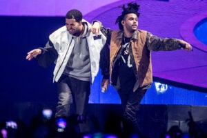 Drake and The Weeknd performing together onstage.