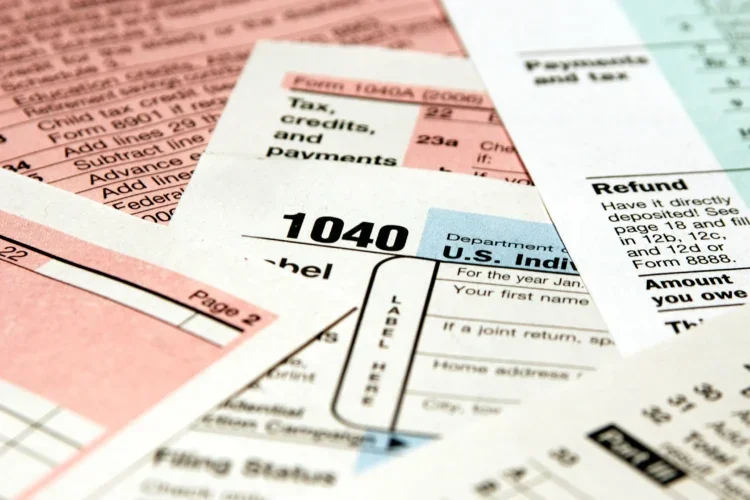 tax forms in a pile