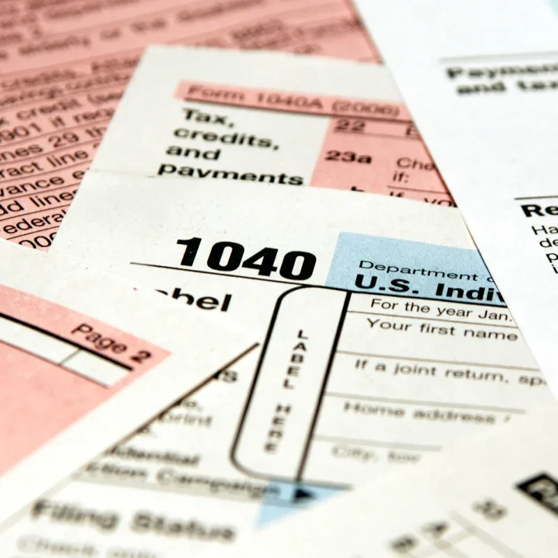 tax forms in a pile