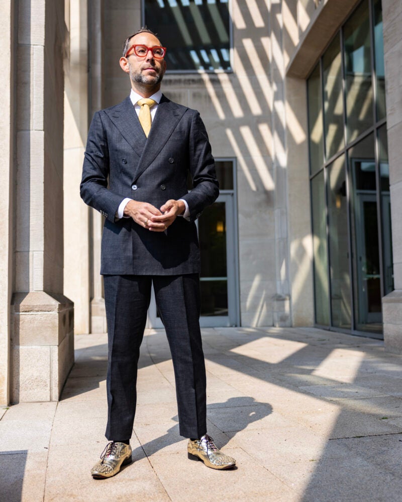 Glenn Cohen standing outside of a law school building