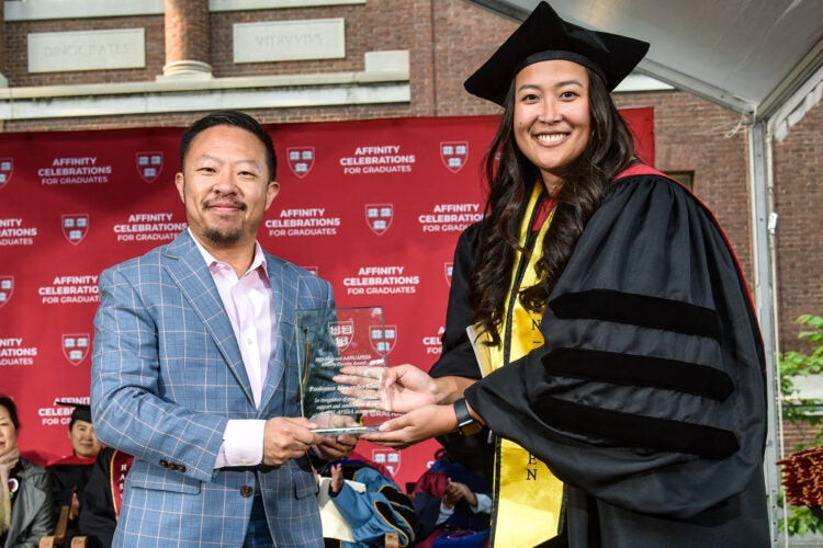 Alexander Chen receiving an award.
