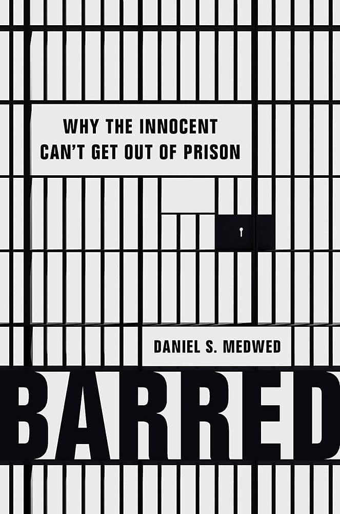 Book cover, black and white photograph of prison bars.
