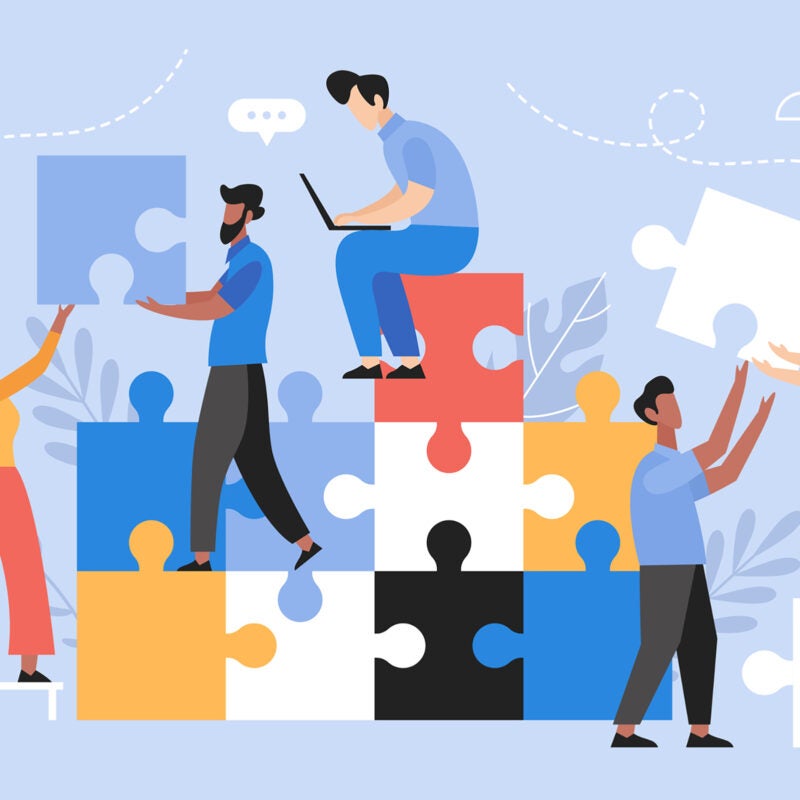 Illustration of people connecting puzzle pieces.