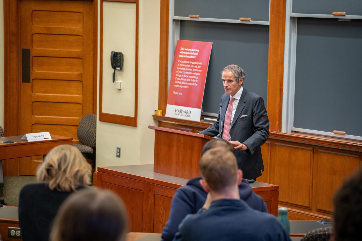 A man speaking at a podium