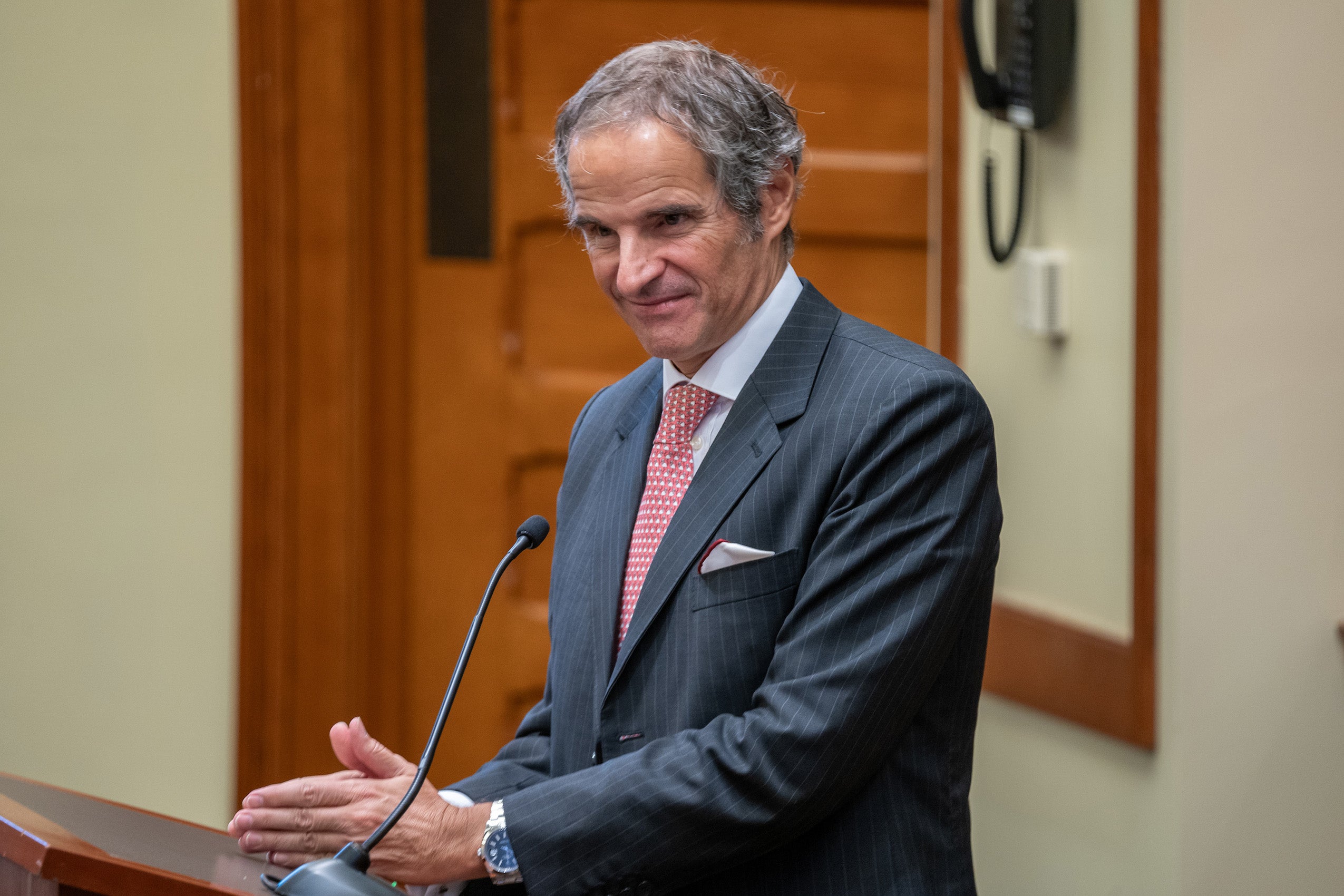 A man speaking at a podium