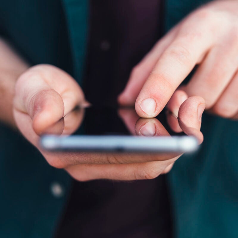 A person using a phone.