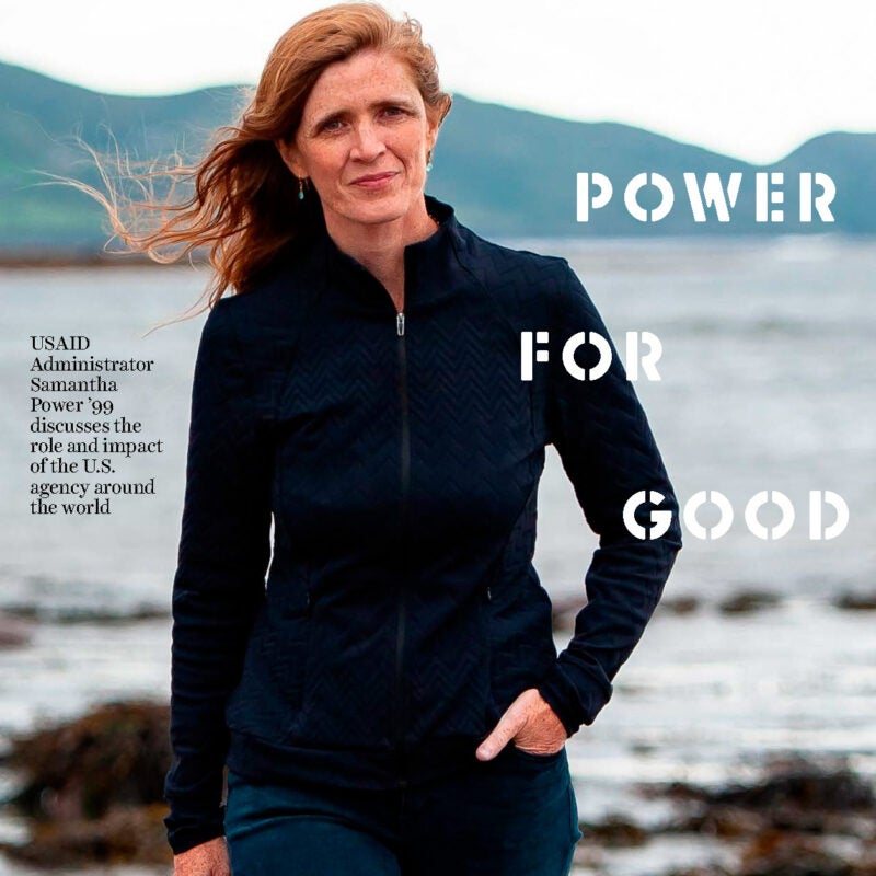 Samantha Power standing in front of water on the cover of the Harvard Law Bulletin