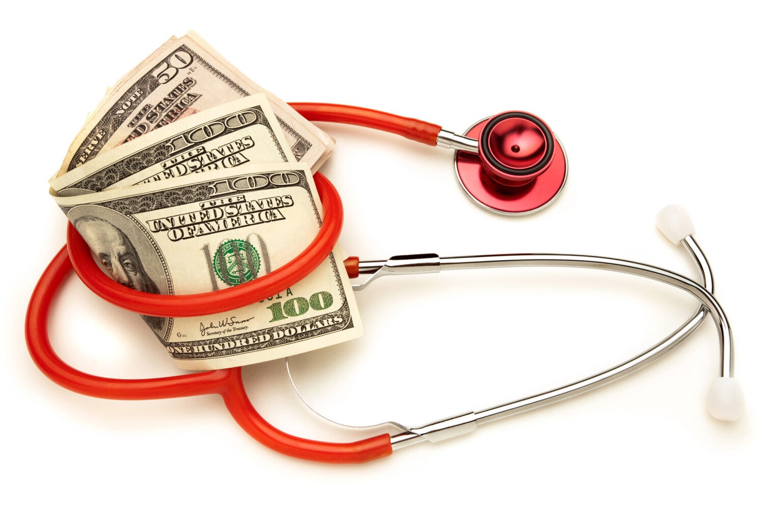 Red stethoscope wrapped around money.