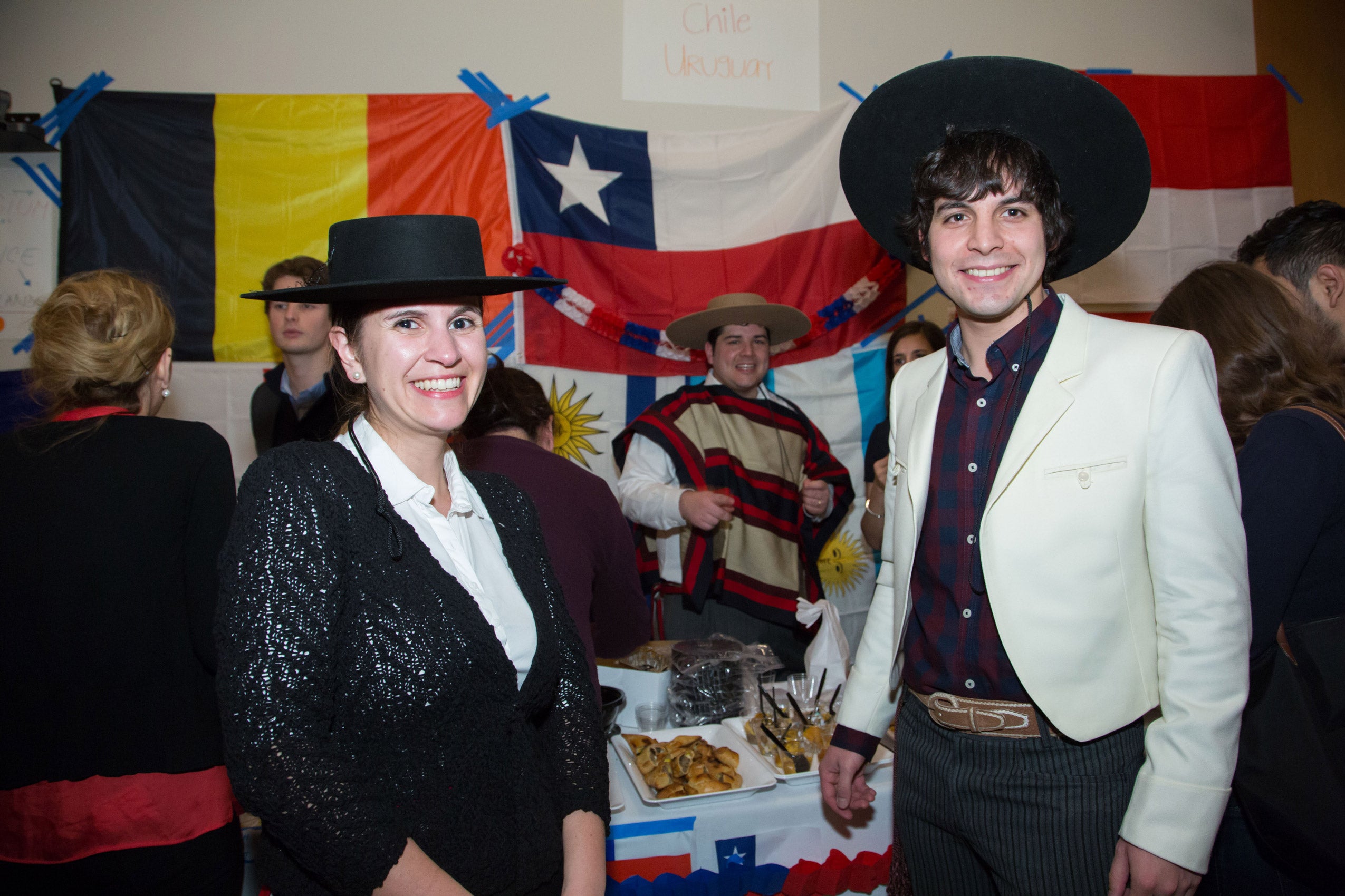 Two people standing together and smiling
