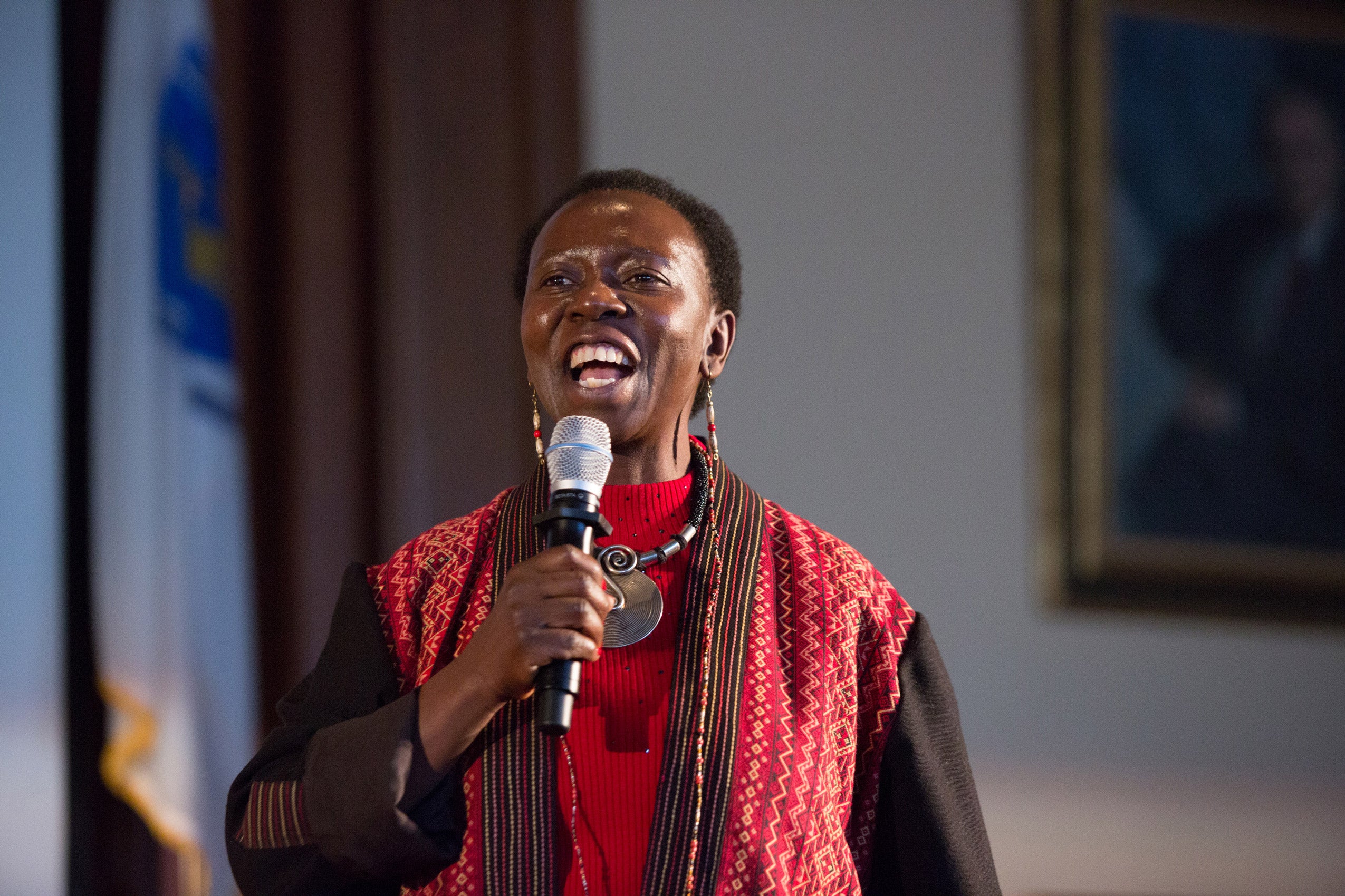 A woman singing into a microphone