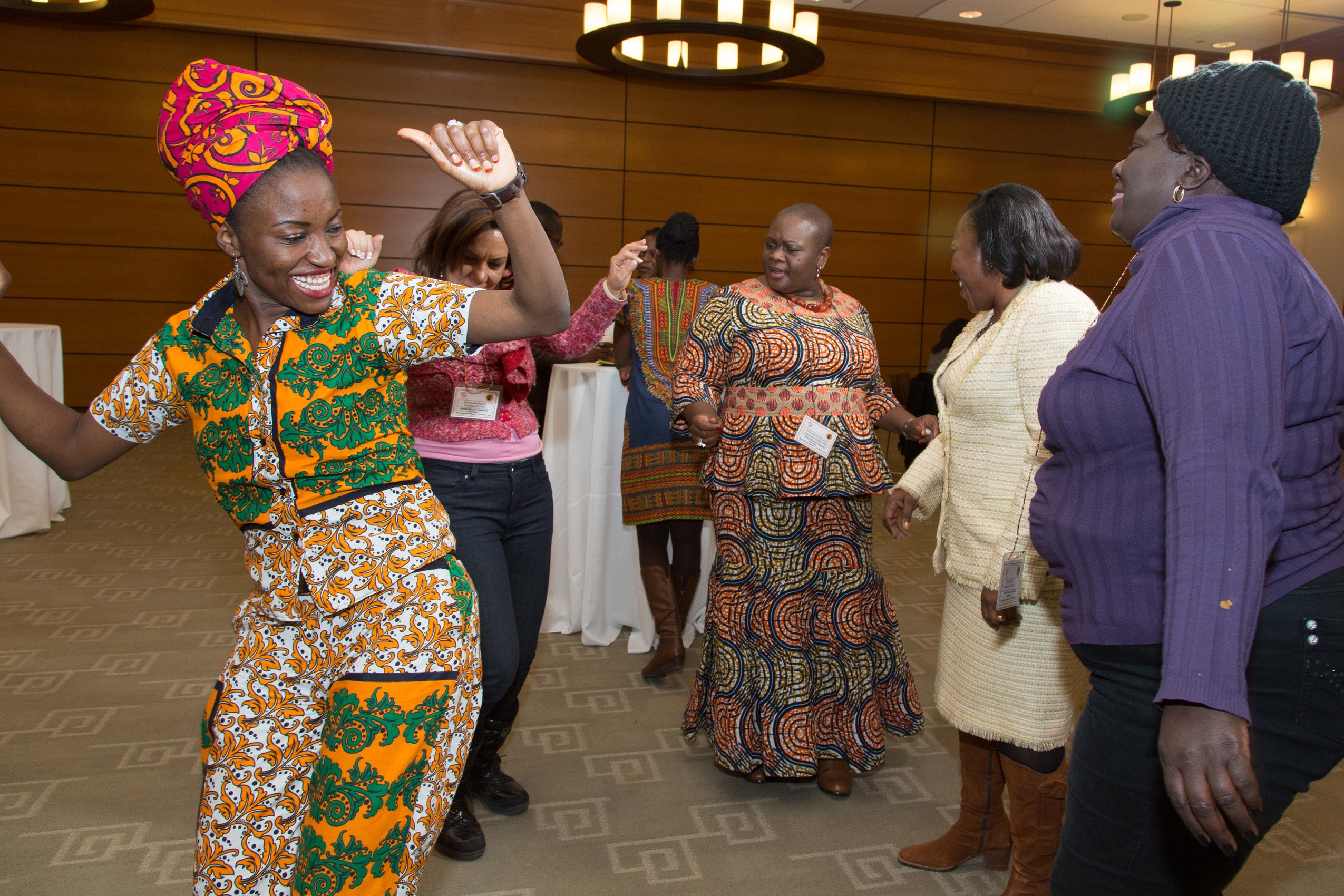 Women dancing together in a circle