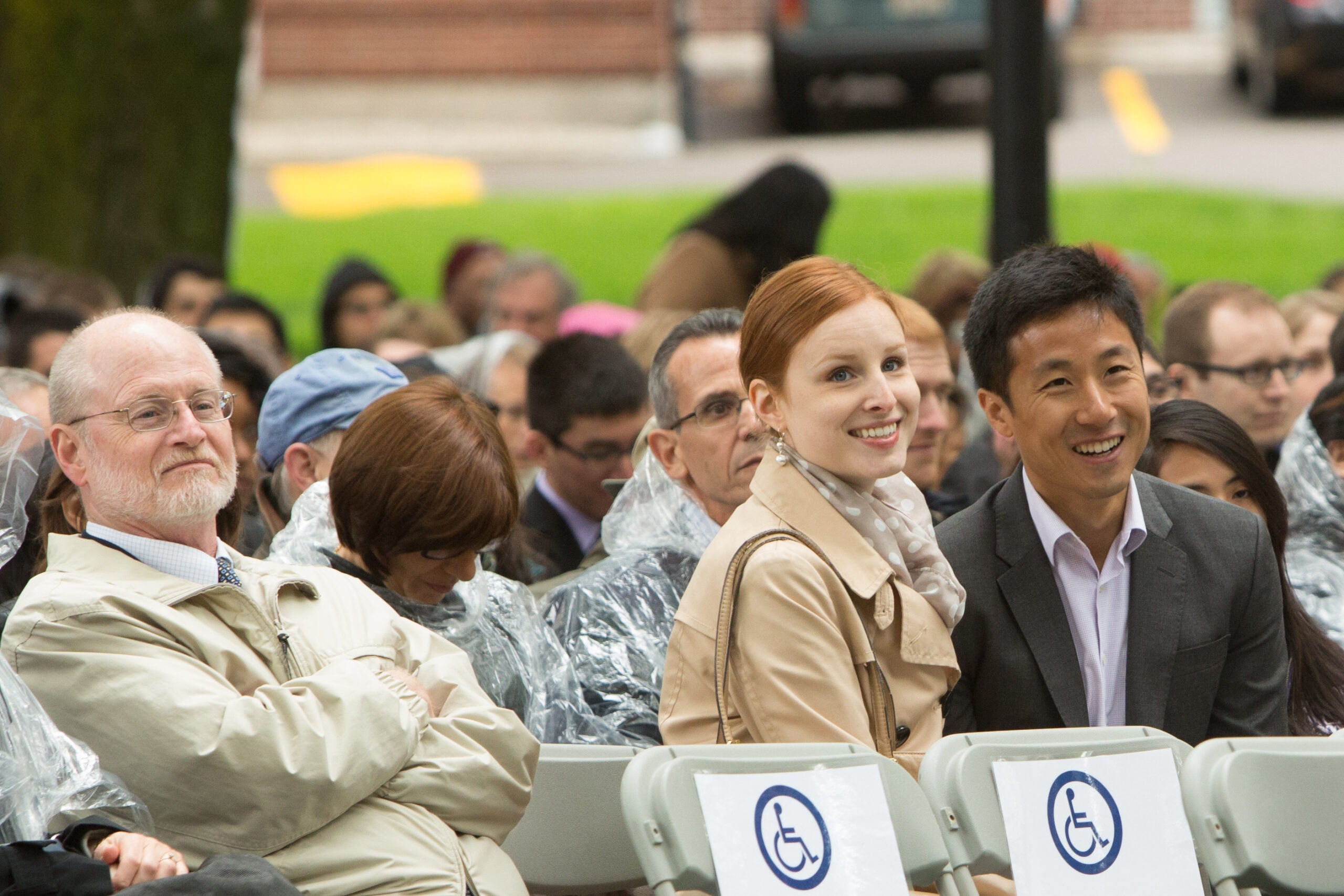 A crowd of people smiling