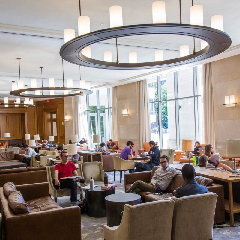 Students relaxing in the lounge in the Caspersen Center