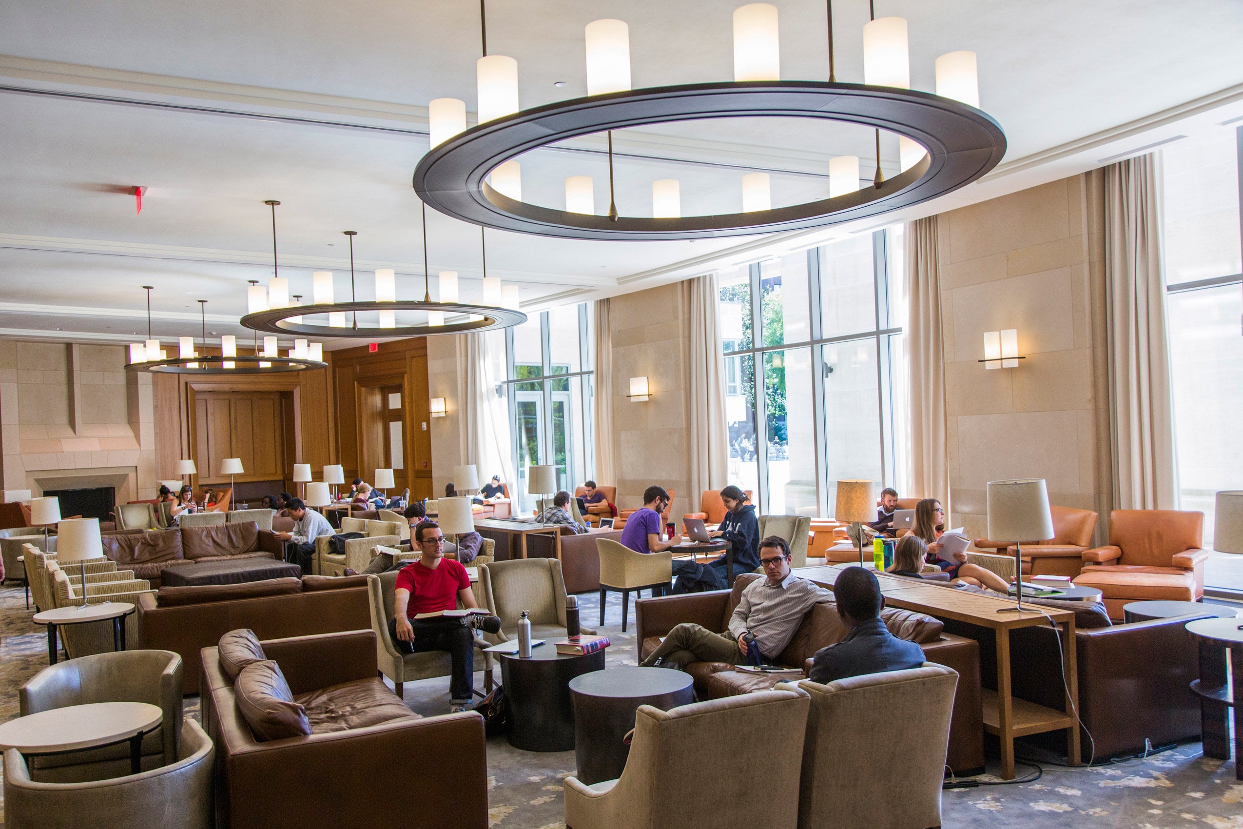 Students relaxing in the lounge in the Caspersen Center