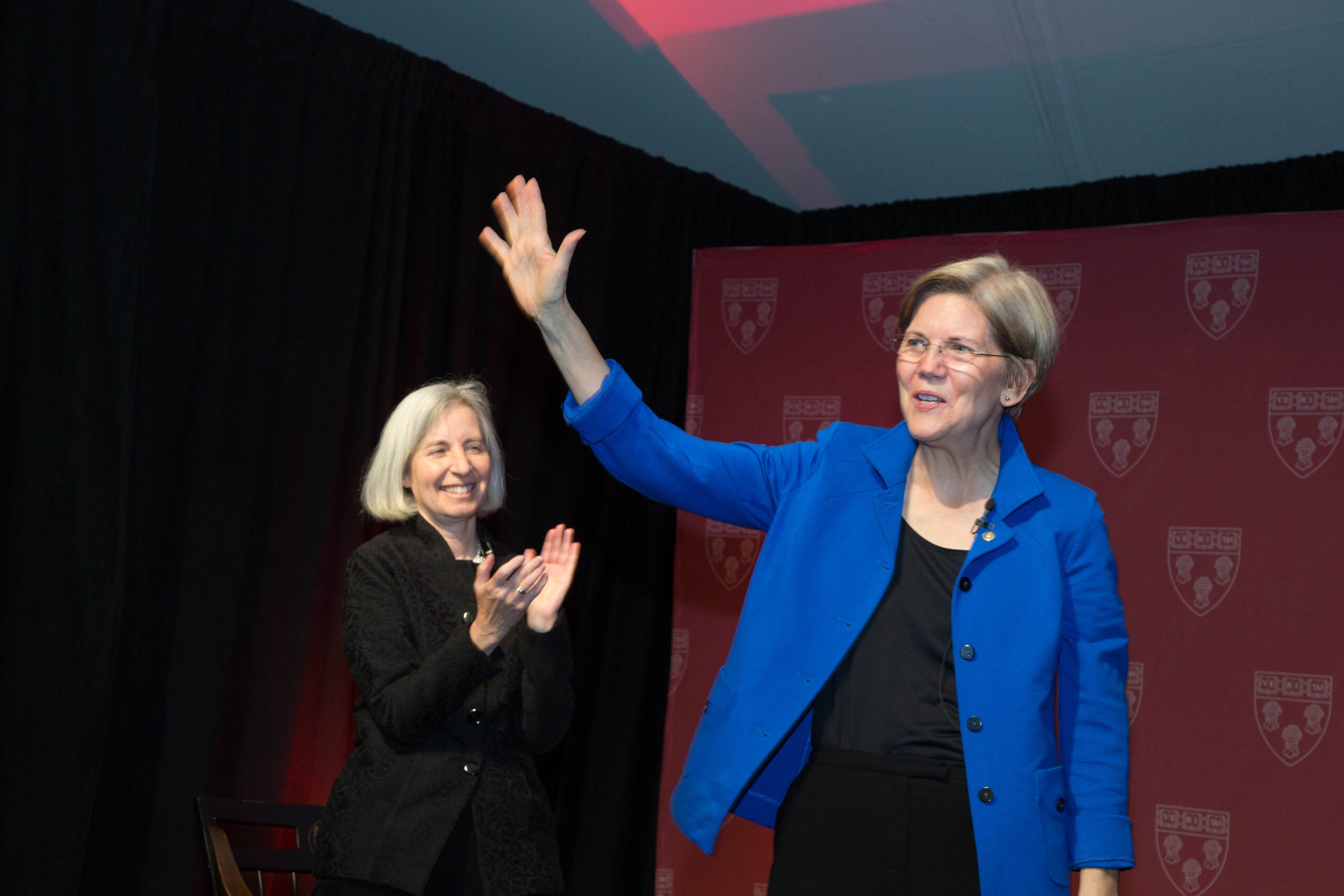 Elizabeth Warren waving, Martha Minow clapping