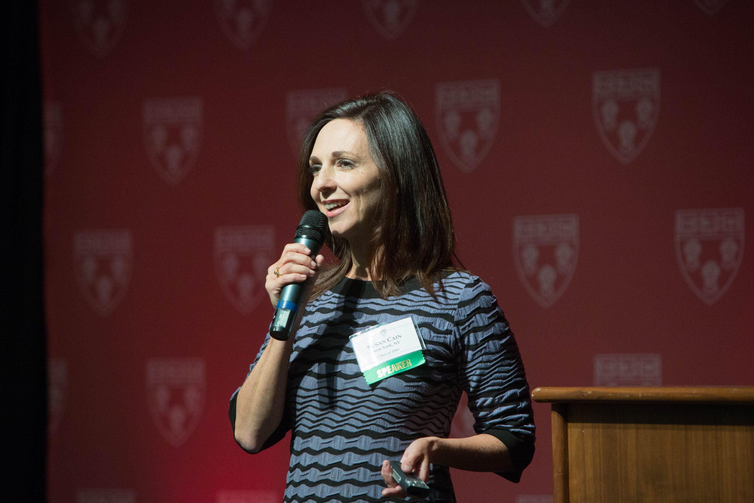 Susan Cain speaking in a microphone