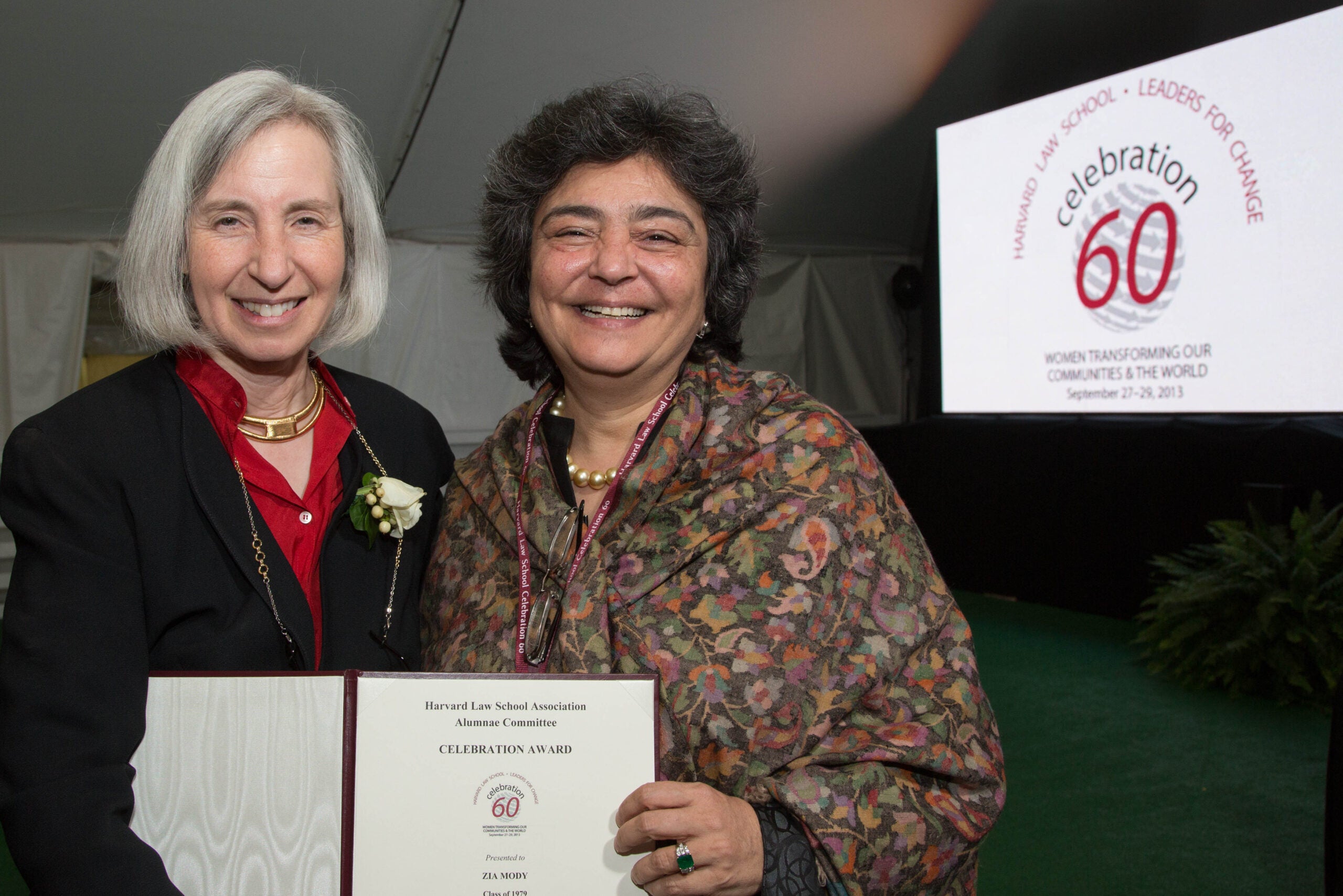 Dean Martha Minow with Zia Mody, who is holding an award