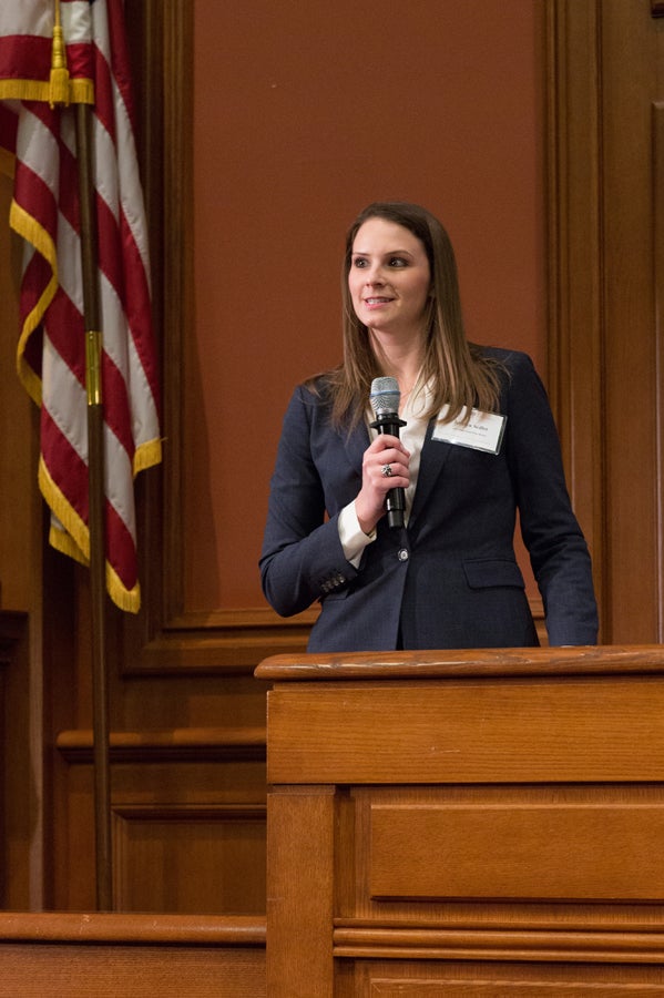 someone speaking into a microphone