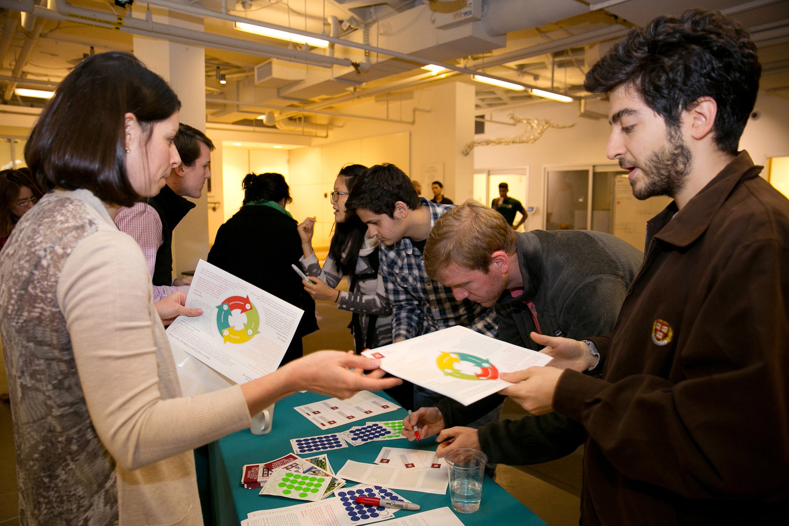 People gathering around a table