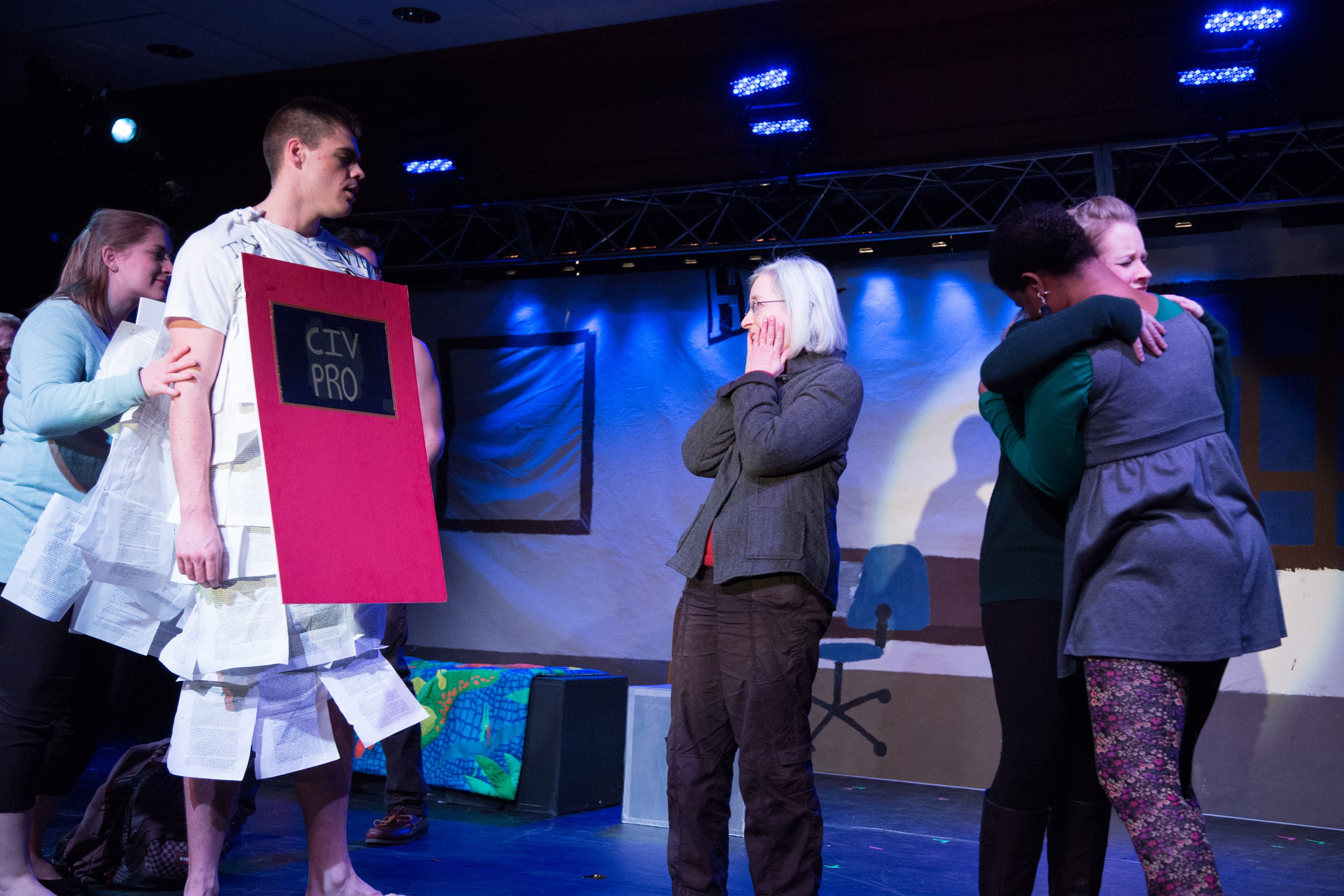 A group of people performing on stage