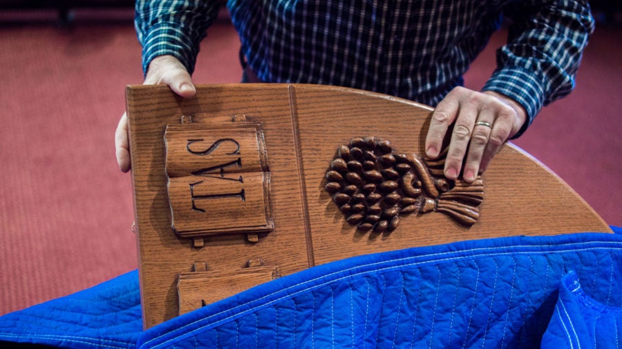 Pulling the wooden law shield out of its case