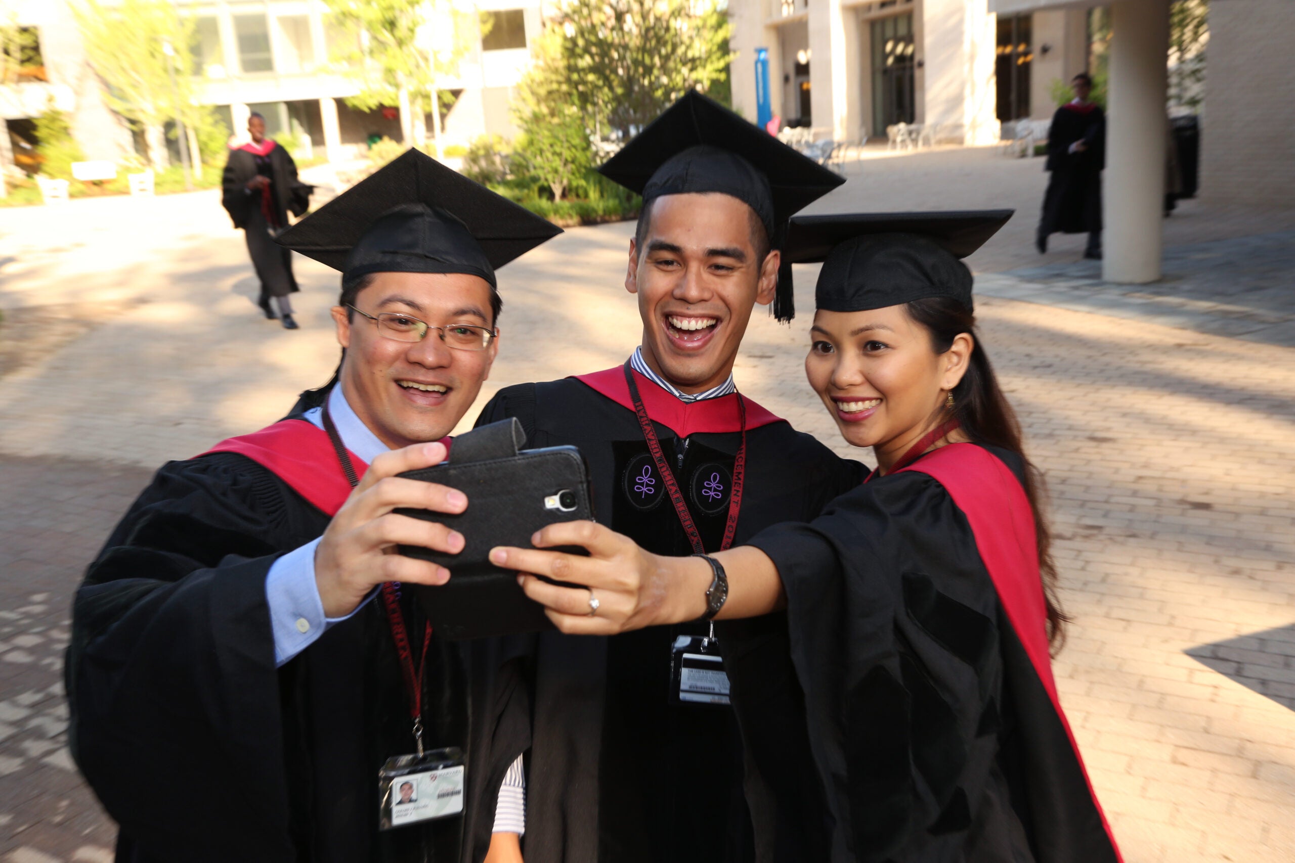 Three graduates taking a selfie
