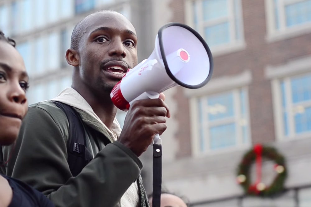 A man speaking into a microphone