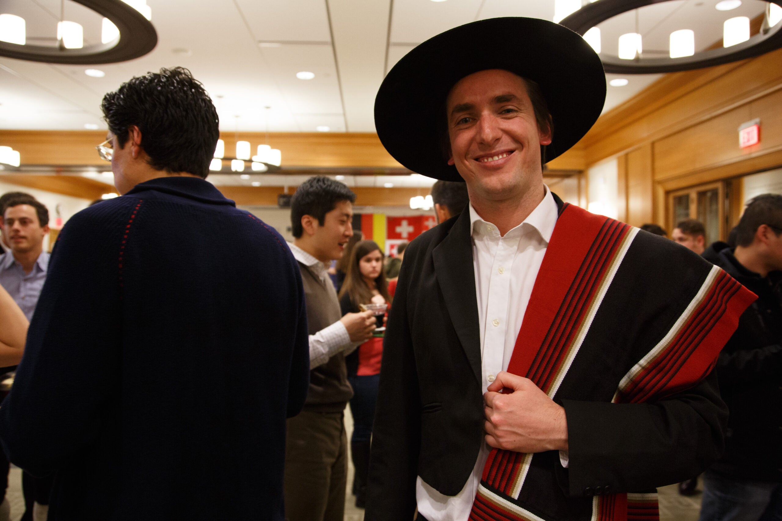 A man posing in traditional dress