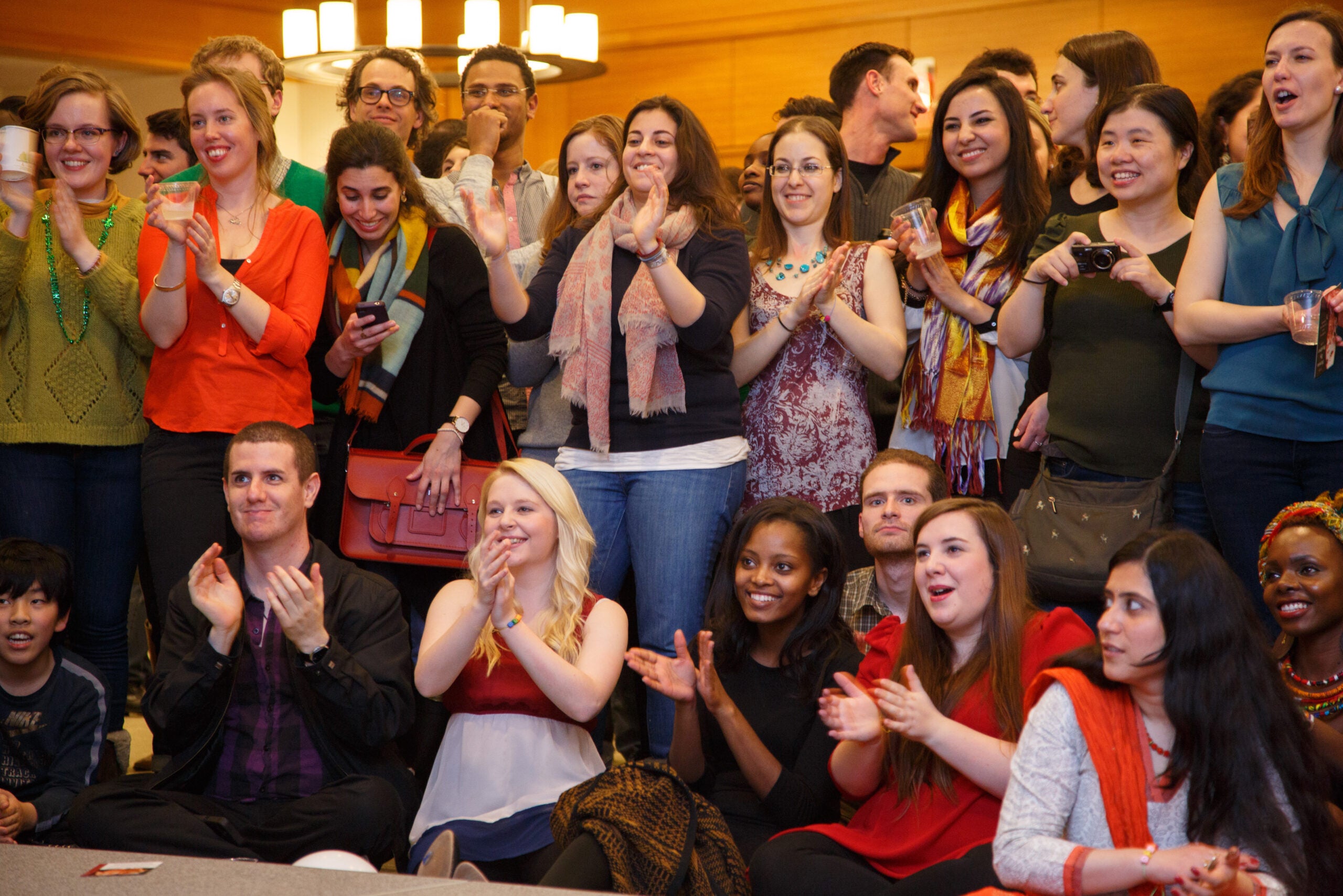The audience cheering and applauding