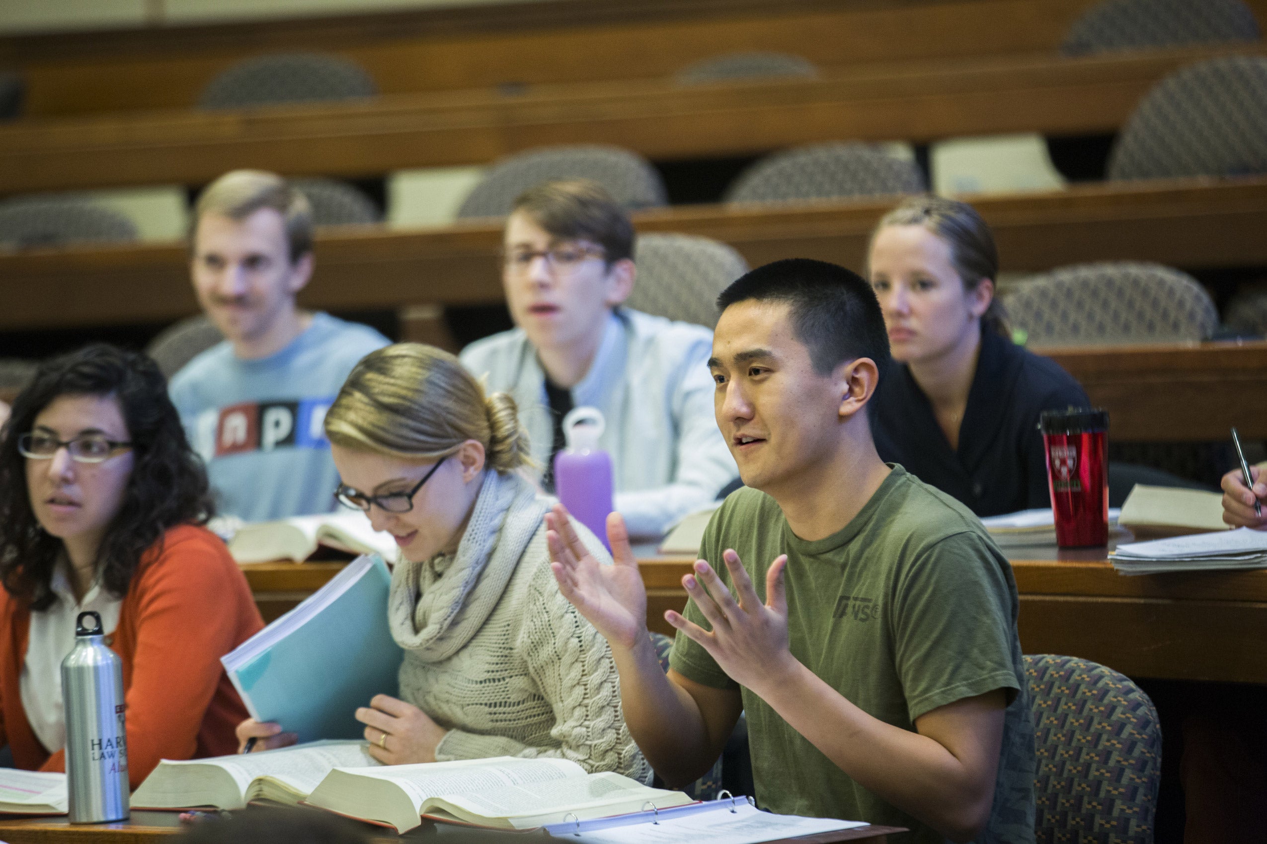 Students seated in a classroom participating in a lecture