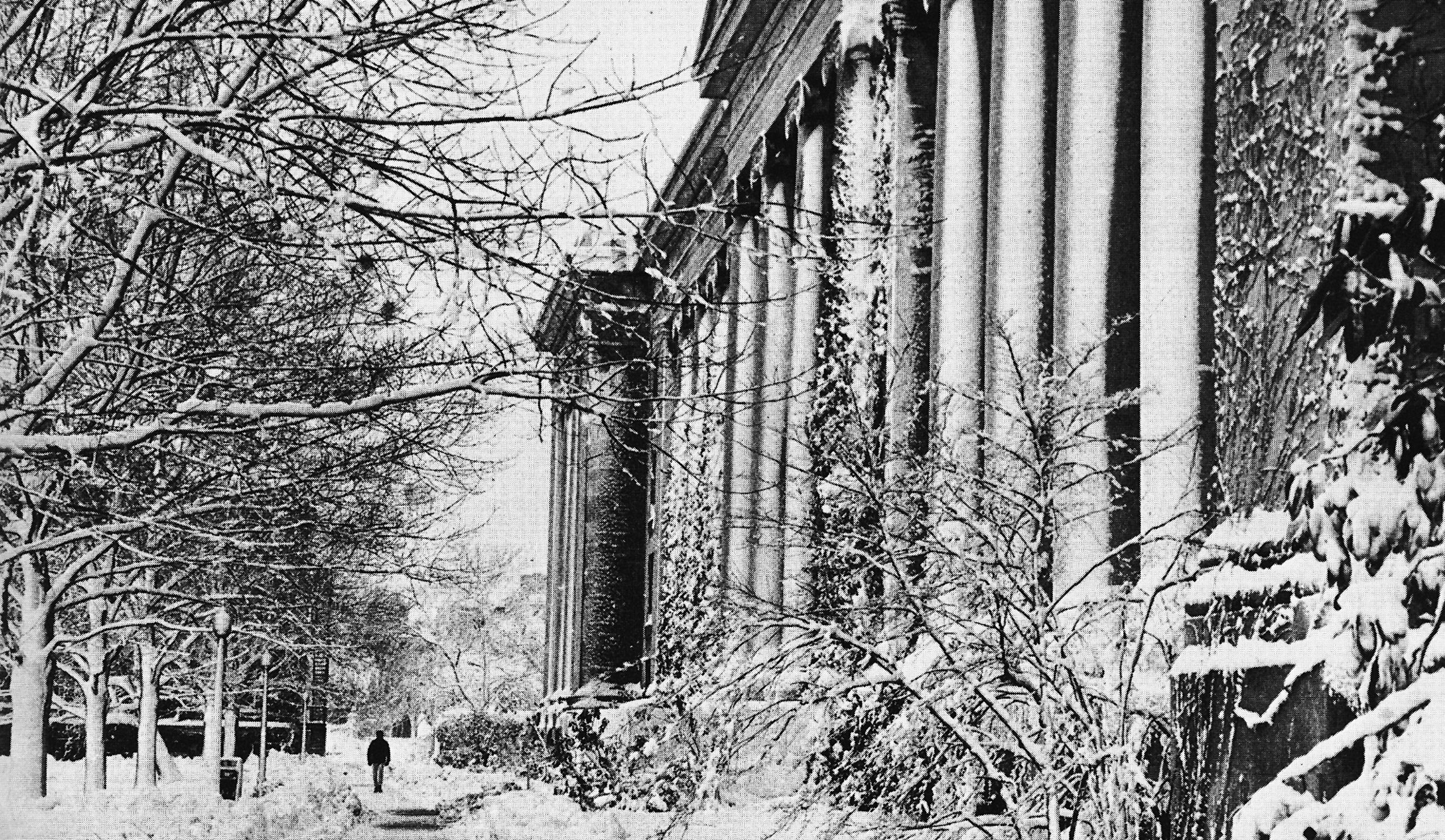 A black and white photo of a snowy Langdell and Holmes Field