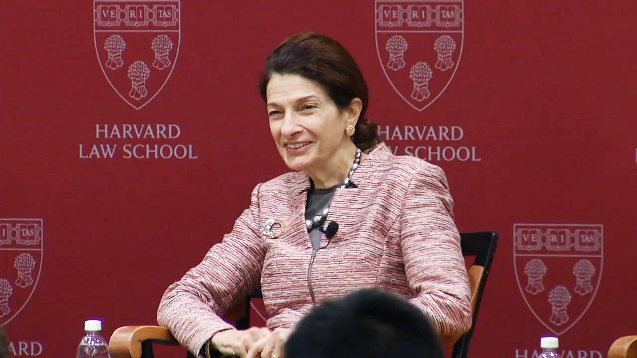 A woman seated in a chair