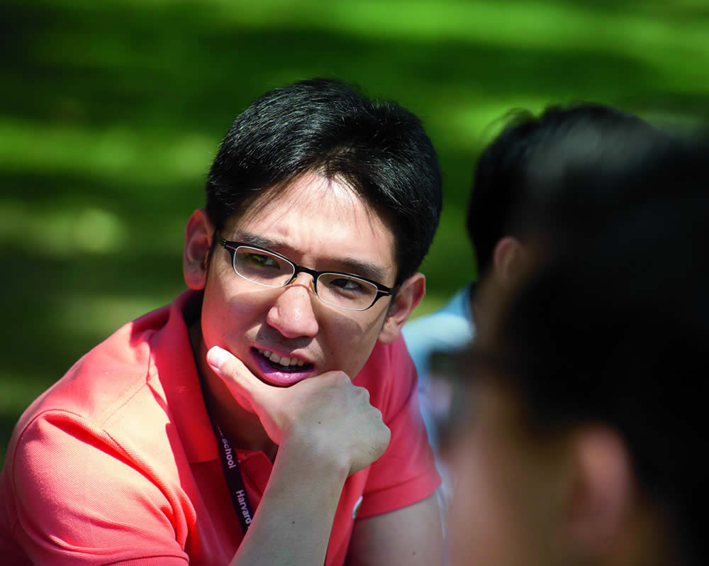 close up of a student's face with hand on the chin