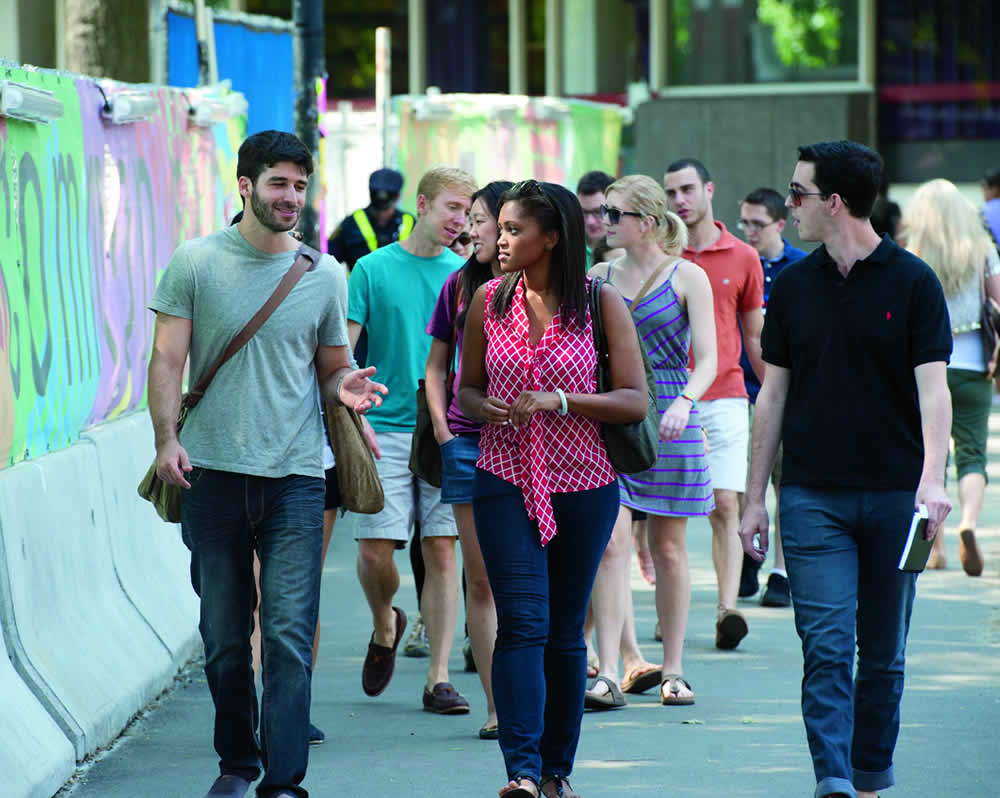 groups of students walking and talking