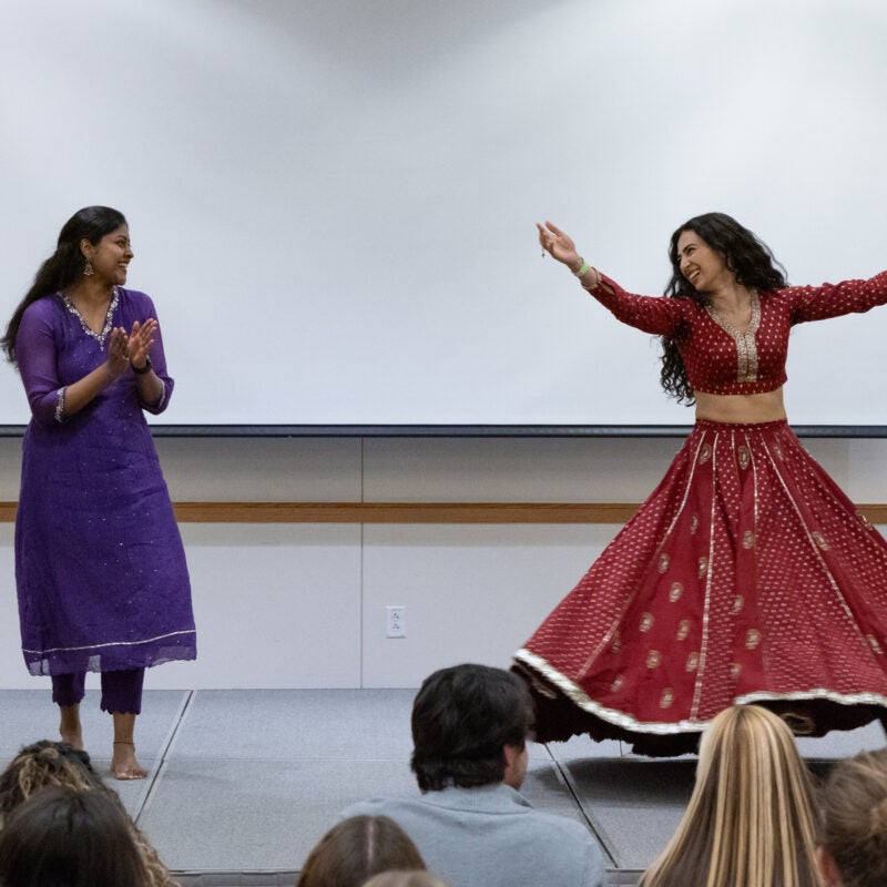 Two students dancing.