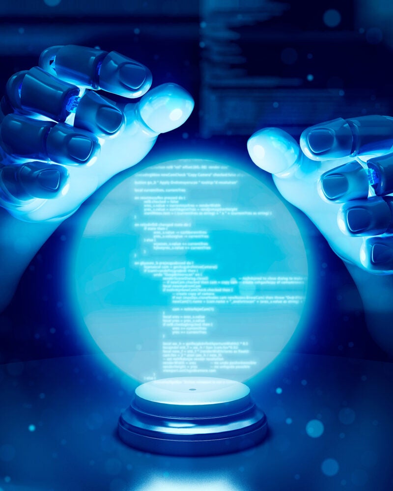 Robot fortune teller hand and showing futuristic code in a glowing hologram ball.