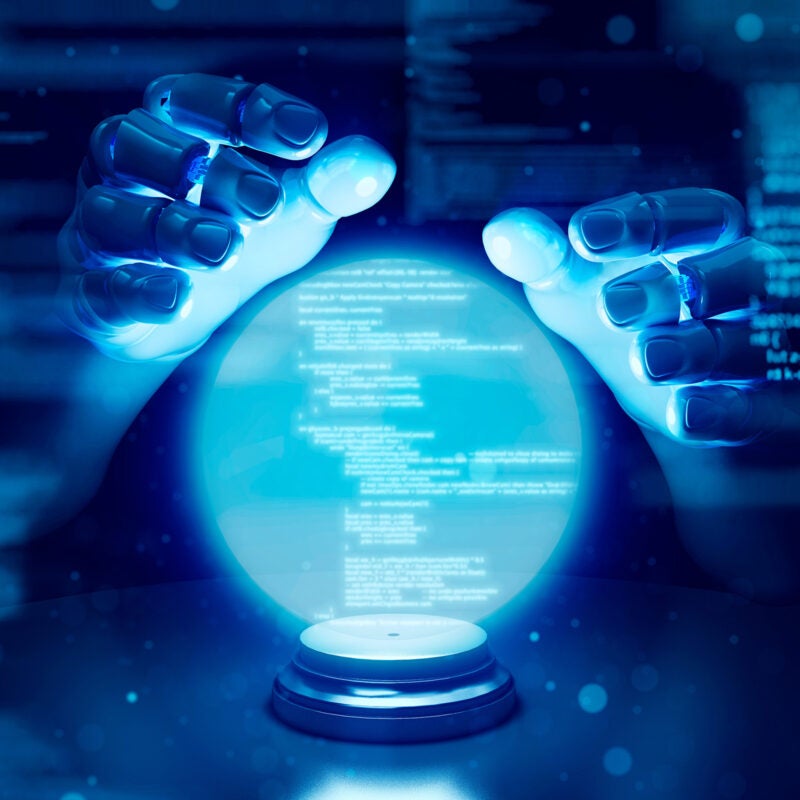 Robot fortune teller hand and showing futuristic code in a glowing hologram ball.